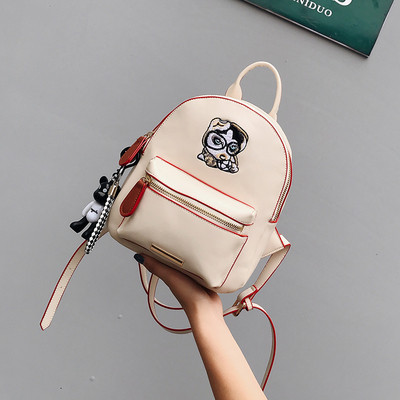 Καθημερινό γυναικείο σακίδιο με μπροστινή τσέπη και κεντήματα σε δύο χρώματα