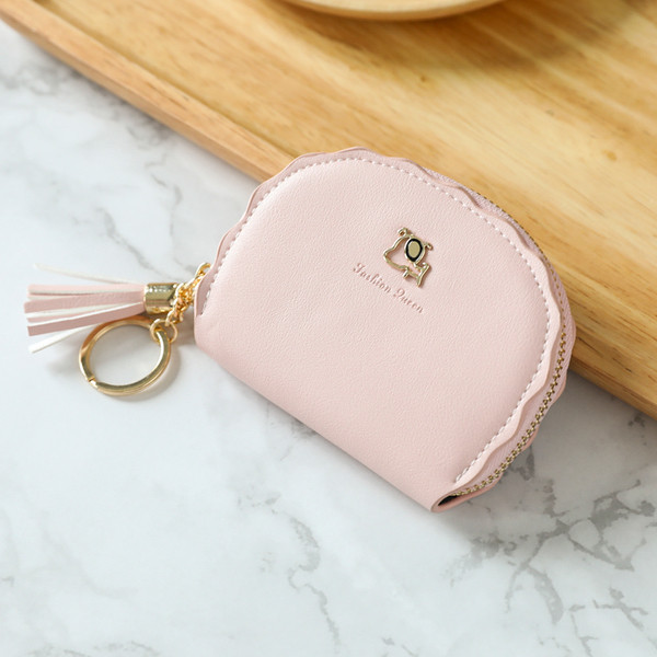 Kis női pénztárca fém díszítéssel