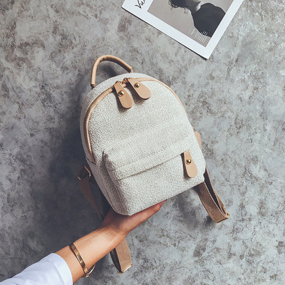 Κομψό μικρό γυναικείο σακίδιο σε τρία χρώματα με μπροστινή τσέπη