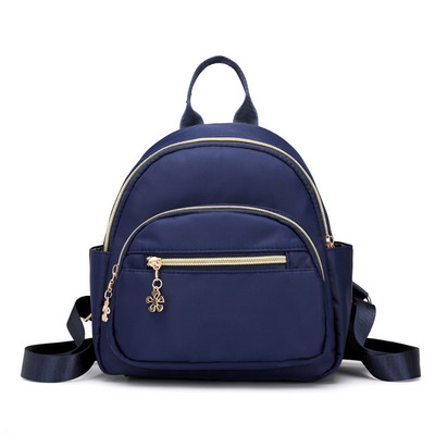 Női hétköznapi hátizsák fém elemekkel több színben