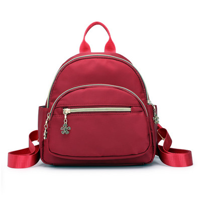 Női hétköznapi hátizsák fém elemekkel több színben