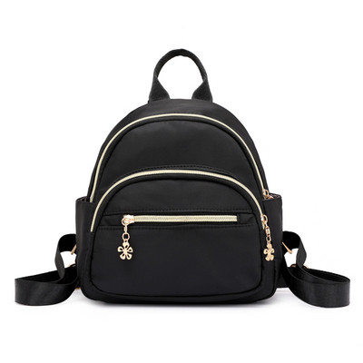 Női hétköznapi hátizsák fém elemekkel több színben