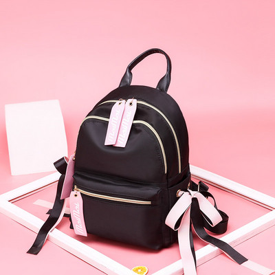 Γυναικείο σακίδιο μαύρο και ροζ με κορδέλες και επιγραφές