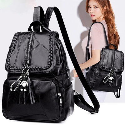 Women`s backpack with a tassel made of eco leather in black color