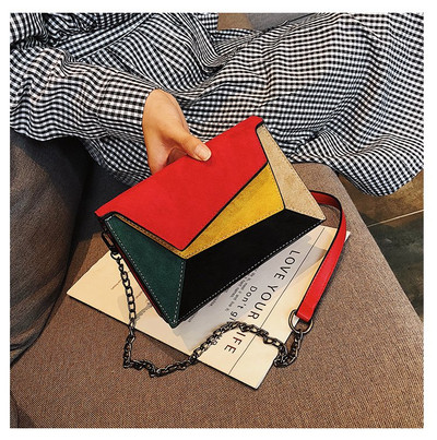 Μοντέρνα γυναικεία τσάντα από οικολογικό σουέτ με μεταλλική λαβή σε διάφορα χρώματα