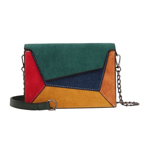 Μοντέρνα γυναικεία τσάντα από οικολογικό σουέτ με μεταλλική λαβή σε διάφορα χρώματα
