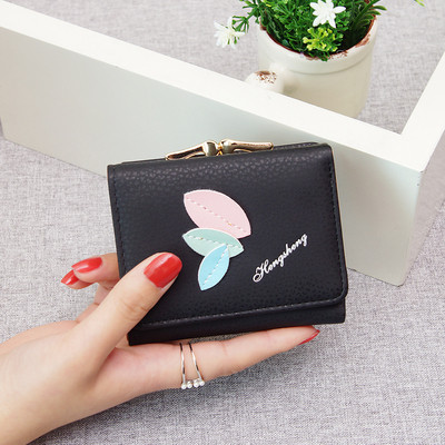 Γυναικείο πορτοφόλι με μεταλλικό κούμπωμα σε διάφορα χρώματα