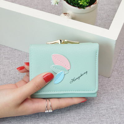 Γυναικείο πορτοφόλι με μεταλλικό κούμπωμα σε διάφορα χρώματα