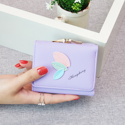 Γυναικείο πορτοφόλι με μεταλλικό κούμπωμα σε διάφορα χρώματα