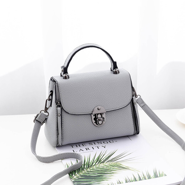 Μοντέρνα γυναικεία τσάντα με κοντή και μακριά λαβή σε διάφορα χρώματα