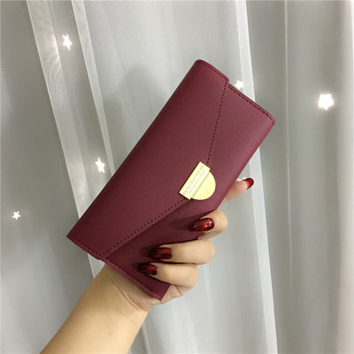 Női pénztárca négy színben fém csattal