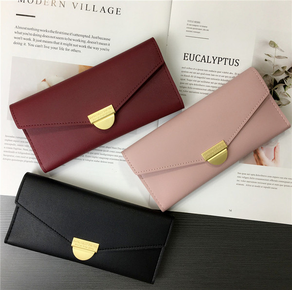 Női pénztárca négy színben fém csattal