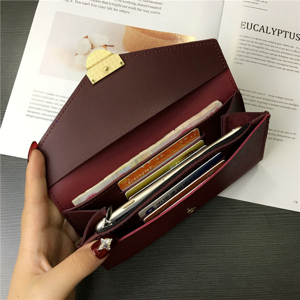 Női pénztárca négy színben fém csattal