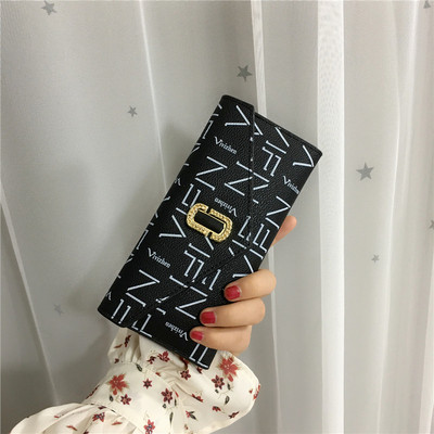 Κομψό γυναικείο πορτοφόλι σε τρία χρώματα με μεταλλική στερέωση