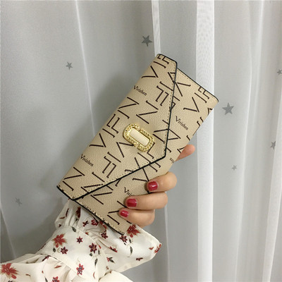 Κομψό γυναικείο πορτοφόλι σε τρία χρώματα με μεταλλική στερέωση