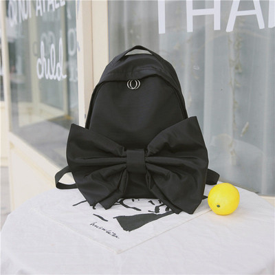 Modern női hátizsák három színben szalaggal