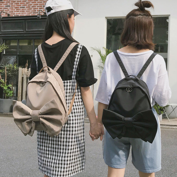 Modern női hátizsák három színben szalaggal