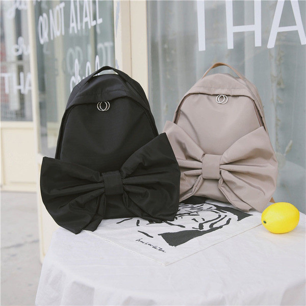 Modern női hátizsák három színben szalaggal