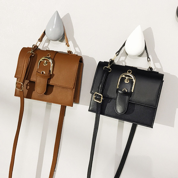 Modern női táska rövid és hosszú füllel, fekete és barna színben