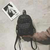 Γυναικείο σακίδιο με μπροκάρ και μπροστινή τσέπη σε διάφορα χρώματα