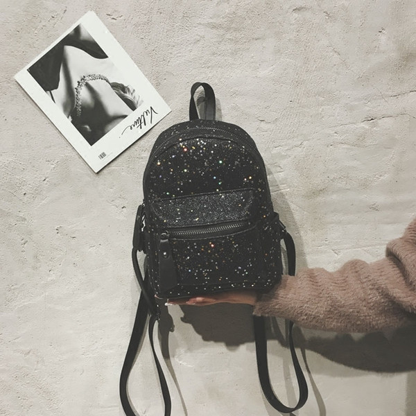 Γυναικείο σακίδιο με μπροκάρ και μπροστινή τσέπη σε διάφορα χρώματα