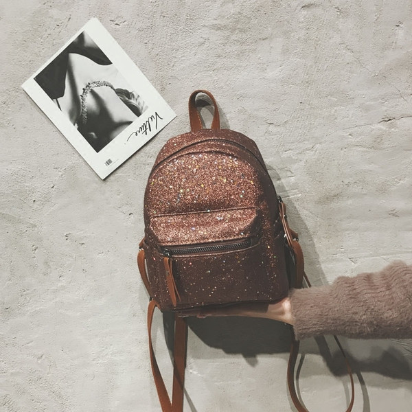 Γυναικείο σακίδιο με μπροκάρ και μπροστινή τσέπη σε διάφορα χρώματα