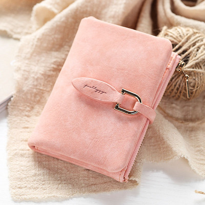 Stylish women`s wallet with metal decoration