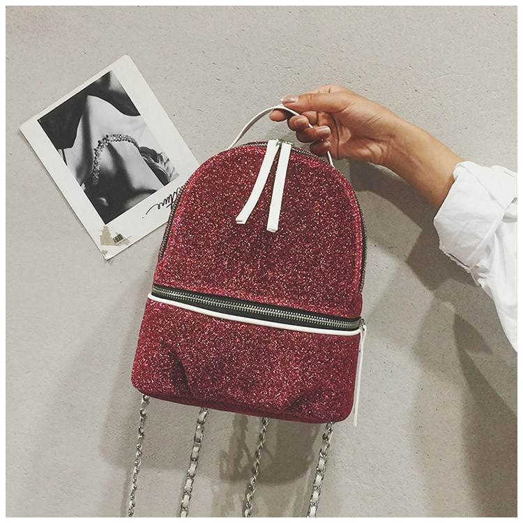 Fényes női hátizsák két színben cipzárral és lánccal