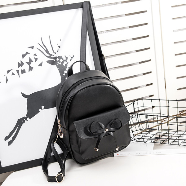 Rucsac de dama cu buzunar frontal si panglica negru