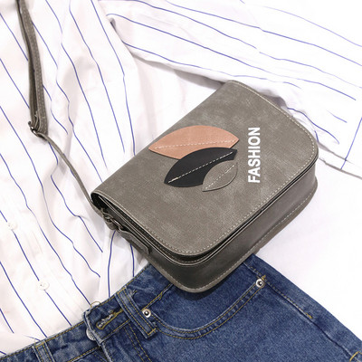 Μοντέρνα γυναικεία τσάντα με τρισδιάστατο στοιχείο σε διάφορα χρώματα