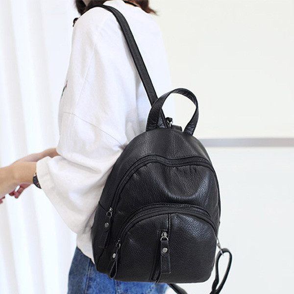 Stílusos női hátizsák fekete műbőrből