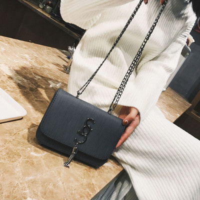 ΝΕΟ Κομψή γυναικεία τσάντα με μεταλλική λαβή σε διάφορα χρώματα