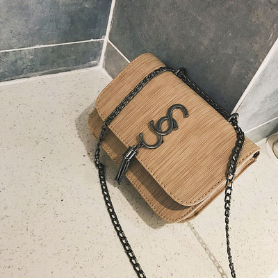 ΝΕΟ Κομψή γυναικεία τσάντα με μεταλλική λαβή σε διάφορα χρώματα