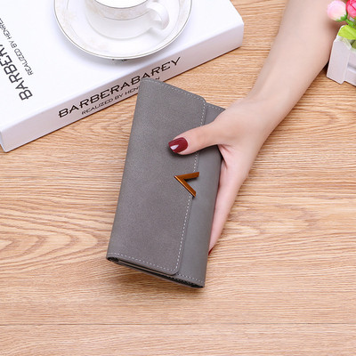 Γυναικείο πορτοφόλι με μεταλλική διακόσμηση σε πέντε χρώματα