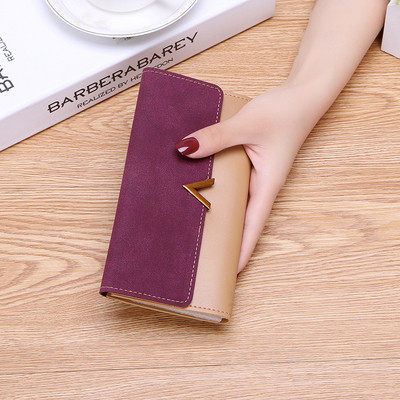 Γυναικείο πορτοφόλι με μεταλλική διακόσμηση σε πέντε χρώματα