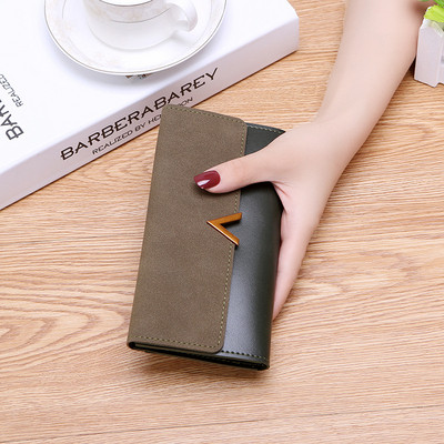 Γυναικείο πορτοφόλι με μεταλλική διακόσμηση σε πέντε χρώματα