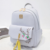 Γυναικείο σακίδιο με φούντα και λουλούδια σε δύο χρώματα