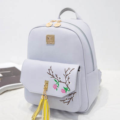 Γυναικείο σακίδιο με φούντα και λουλούδια σε δύο χρώματα