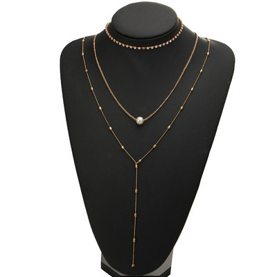 Απαλό γυναικείο σύνολο από τρία κολιέ με πέρλες σε χρυσό και ασημί χρώμα