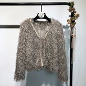 Κομψή γυναικεία ζακέτα με ντεκολτέ σε σχήμα V