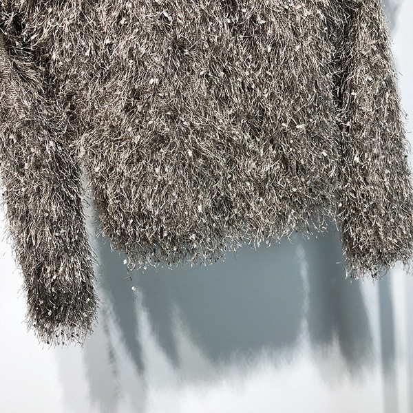 Κομψή γυναικεία ζακέτα με ντεκολτέ σε σχήμα V