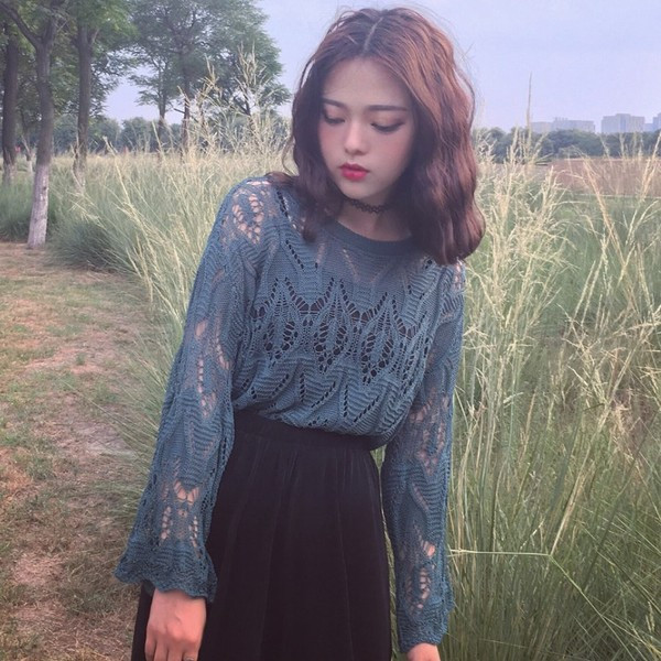 Γυναικεία μοντέρνα μπλούζα σε  μπλε χρώμα με φαρδιά μανίκια