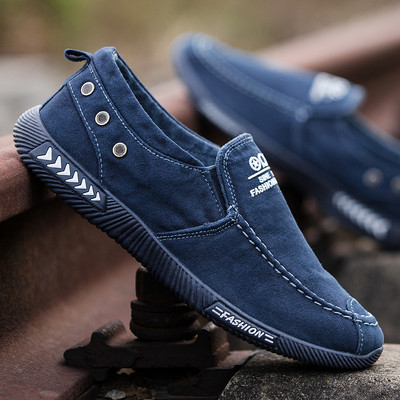 Casual men`s moccasins with an inscription in two colors