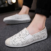 Κομψά ανδρικά μοκασίνια σε μαύρο και άσπρο χρώμα