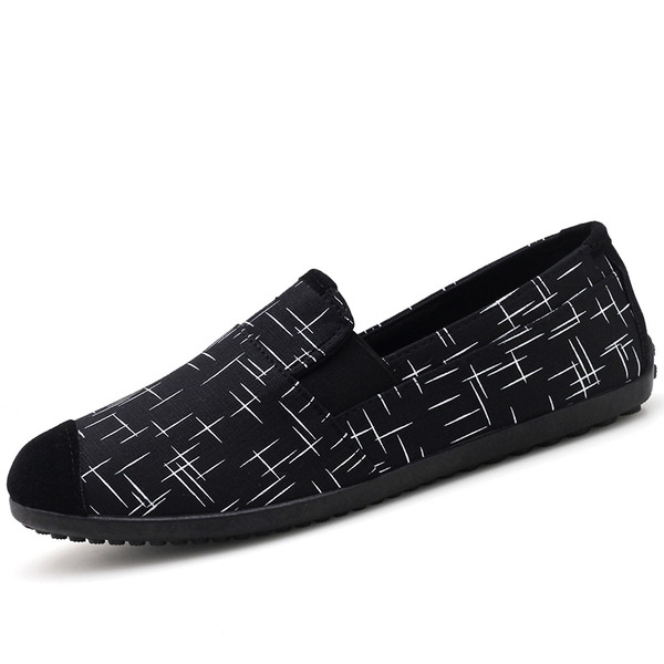 Κομψά ανδρικά μοκασίνια  σε μαύρο και άσπρο χρώμα