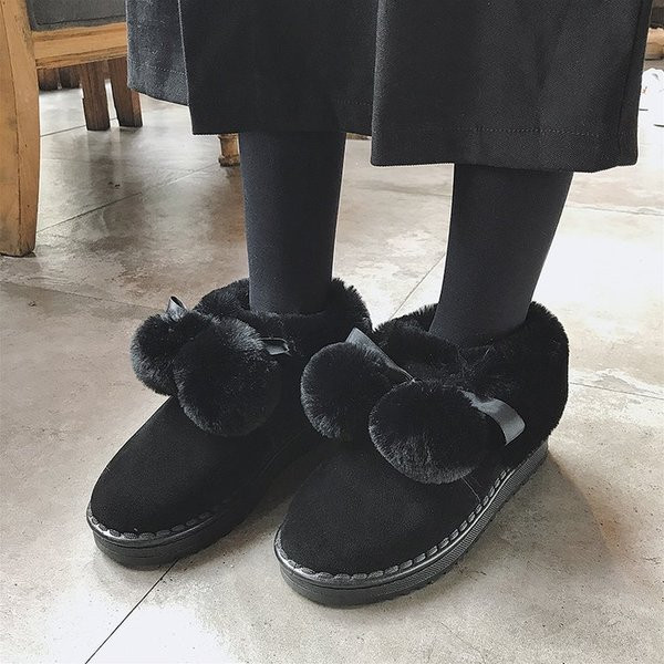 Γυναικείες χειμωνιάτικες μπότες σε γκρι και μαύρο χρώμα