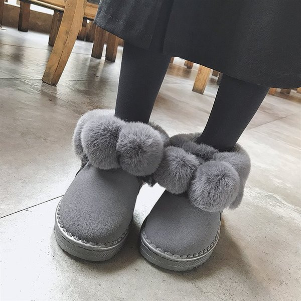 Γυναικείες χειμωνιάτικες μπότες σε γκρι και μαύρο χρώμα