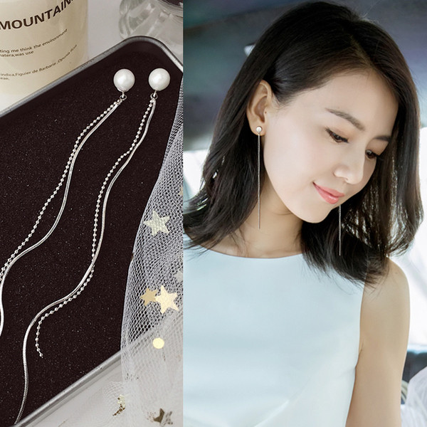 Hosszú, modern női fülbevaló gyöngyökkel