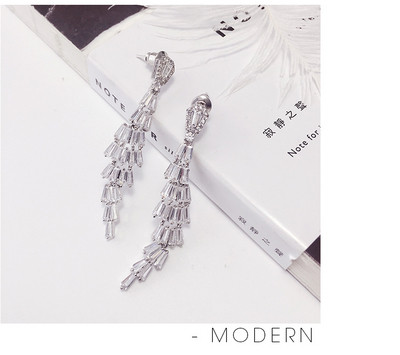 Γυναικεία κομψά κρέμονται σκουλαρίκια με πέτρες