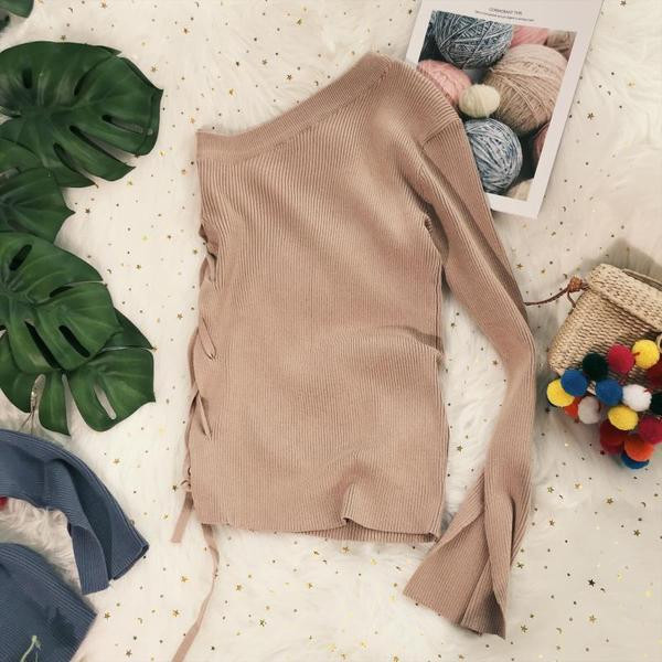 Modern női blúz egyujjal és oldalsó megkötővel, több színben